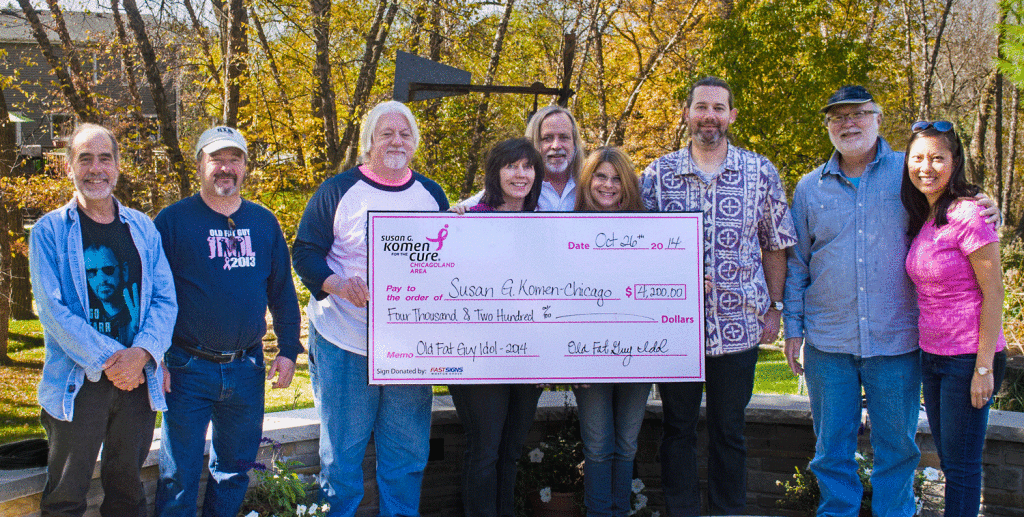 Old Fat Guy Idol volunteers present check to Susan G Komen - Dhicago